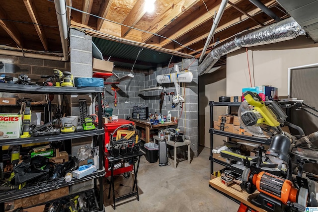 basement with a workshop area