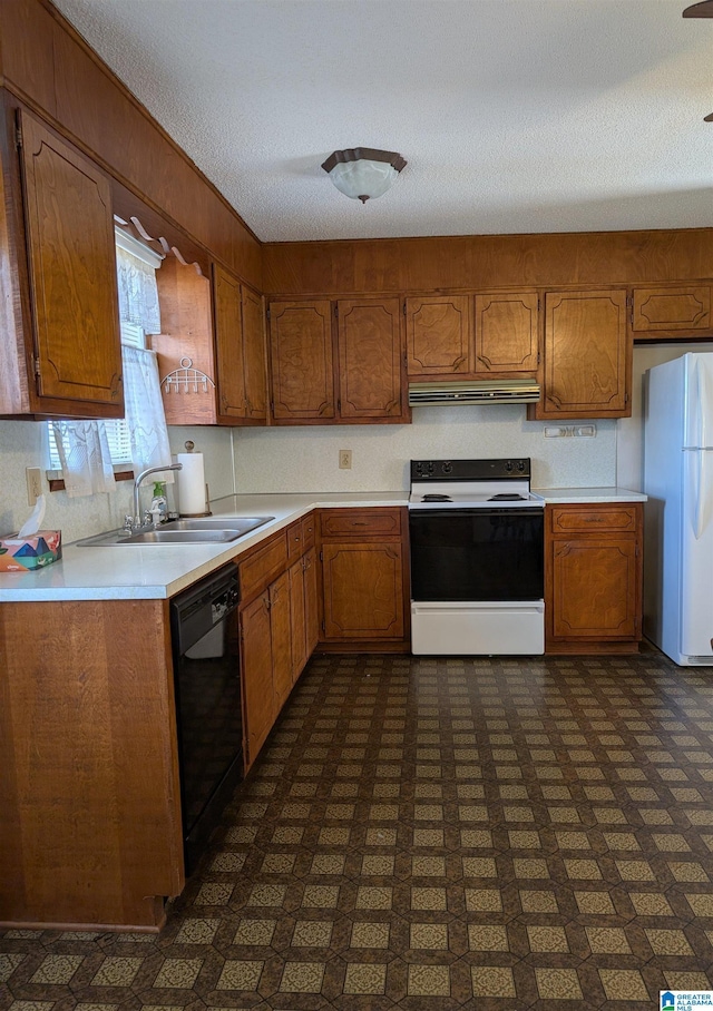 kitchen featuring extractor fan, a sink, black dishwasher, freestanding refrigerator, and electric range oven