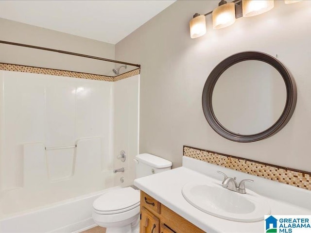 full bath with shower / bathing tub combination, vanity, and toilet