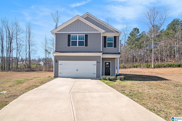 view of front facade with a garage, driveway, a front lawn, and board and batten siding