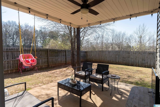 view of patio / terrace with ceiling fan and a fenced backyard