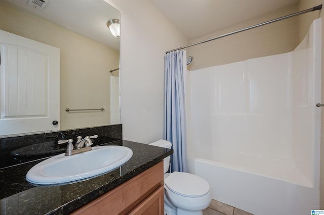 bathroom with visible vents, toilet, tile patterned flooring, shower / bath combo with shower curtain, and vanity