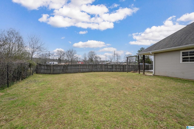 view of yard with a fenced backyard