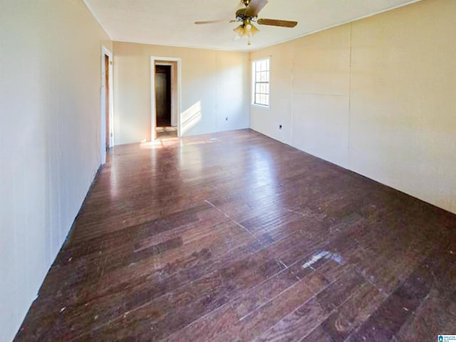 unfurnished room featuring a ceiling fan and hardwood / wood-style flooring