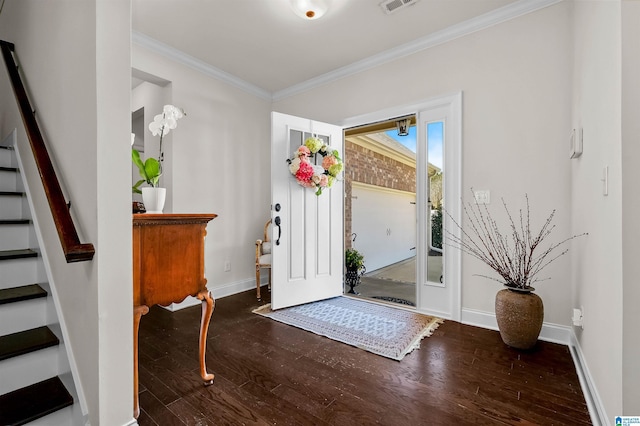 entryway featuring stairway, baseboards, ornamental molding, and wood finished floors