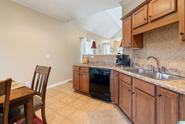 kitchen featuring light tile patterned floors, tasteful backsplash, black dishwasher, brown cabinetry, and a sink