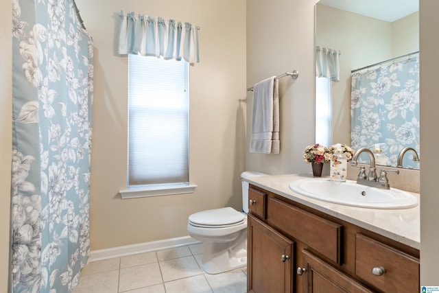 bathroom featuring baseboards, toilet, tile patterned floors, curtained shower, and vanity