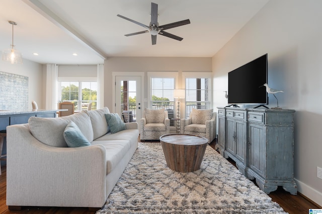 living room with baseboards, dark wood finished floors, a ceiling fan, and recessed lighting