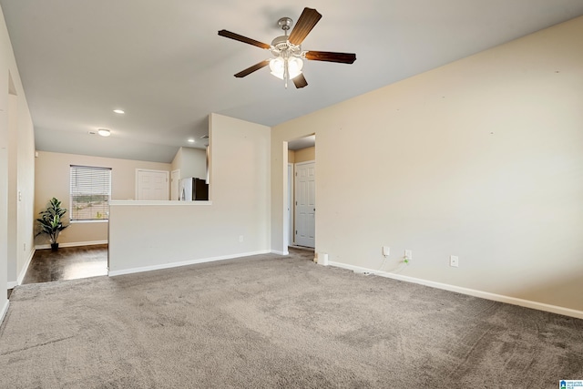 unfurnished living room with ceiling fan, baseboards, carpet flooring, and recessed lighting