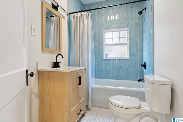 bathroom with tile patterned floors, vanity, toilet, and shower / tub combo with curtain