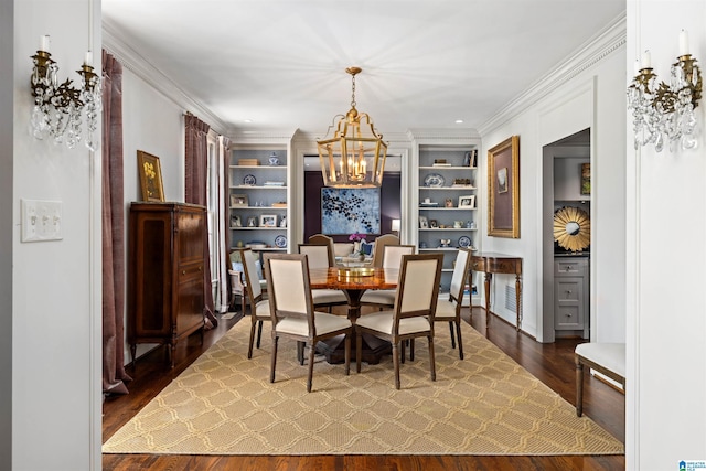 dining area featuring crown molding, built in shelves, a chandelier, and dark wood-style flooring