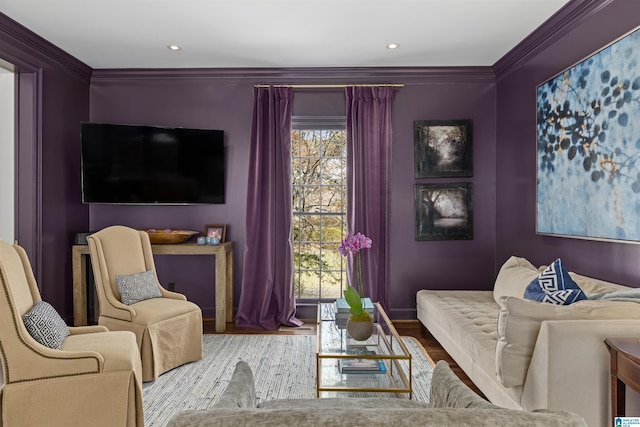 living area featuring ornamental molding, wood finished floors, and recessed lighting