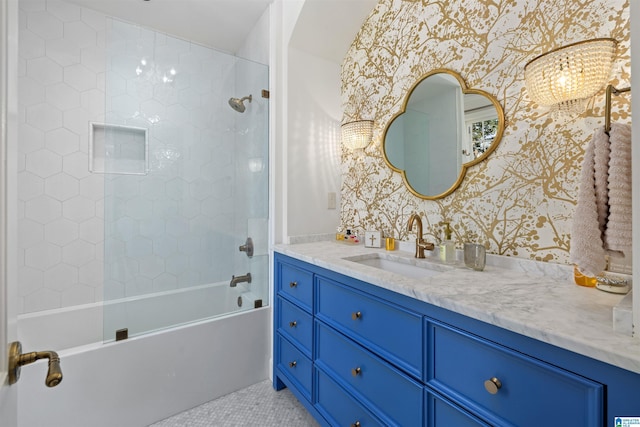 full bath featuring tile patterned flooring, bathtub / shower combination, vanity, and wallpapered walls