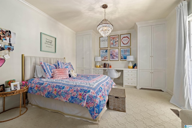 bedroom featuring a notable chandelier, light colored carpet, visible vents, built in study area, and crown molding