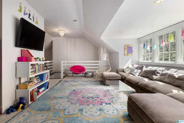 living area with recessed lighting, visible vents, and vaulted ceiling