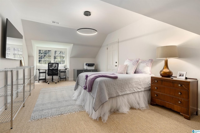 bedroom with light carpet, baseboards, visible vents, and lofted ceiling