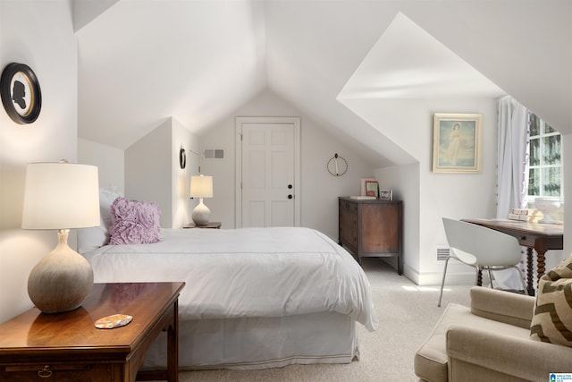 bedroom featuring light carpet, visible vents, and lofted ceiling