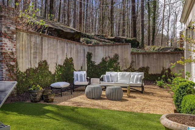 view of patio / terrace with outdoor lounge area and a fenced backyard