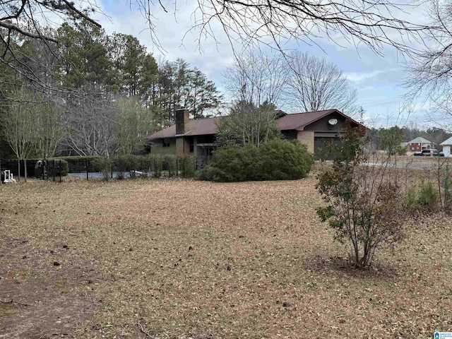 view of front of property with a chimney