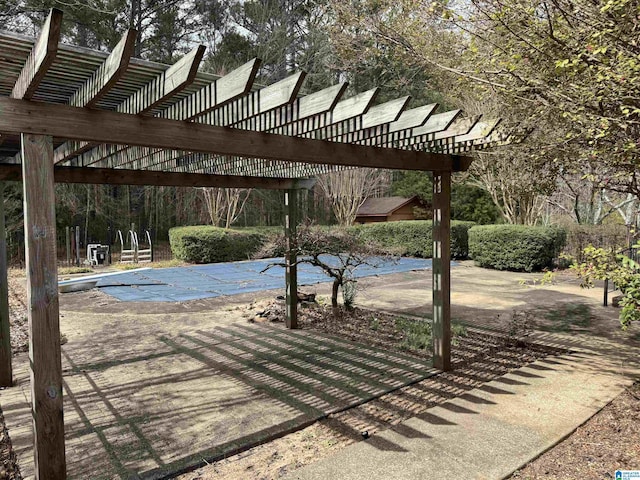 exterior space featuring a pergola and a patio