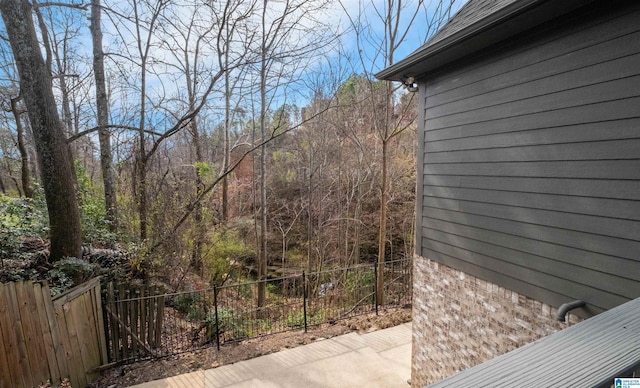 view of patio featuring fence