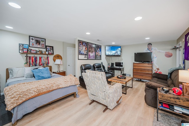 bedroom featuring light wood-type flooring and recessed lighting