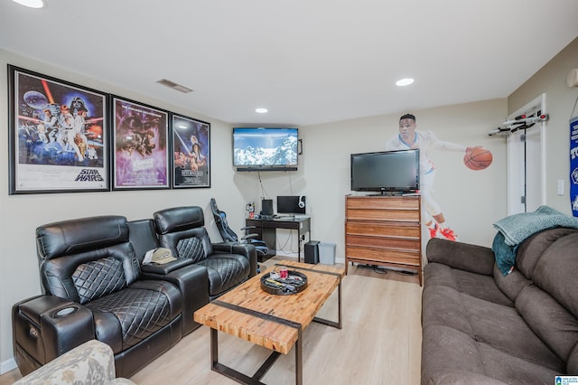 living room featuring recessed lighting, visible vents, and wood finished floors