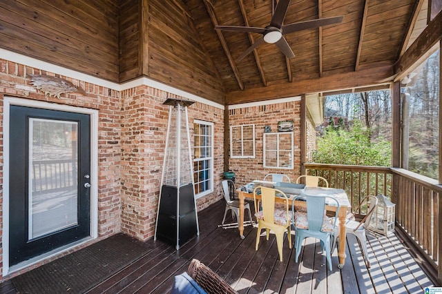 deck with ceiling fan and outdoor dining space