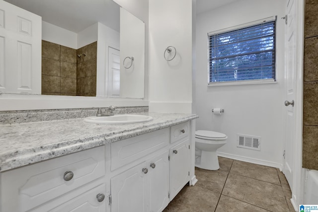 full bath with tile patterned flooring, toilet, vanity, visible vents, and a shower