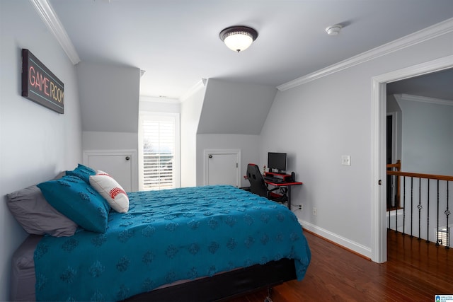 bedroom with ornamental molding, baseboards, and wood finished floors