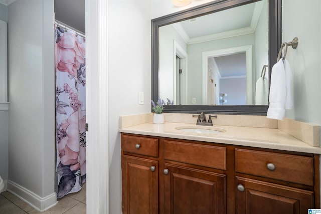 full bathroom featuring crown molding, a shower with shower curtain, vanity, baseboards, and tile patterned floors