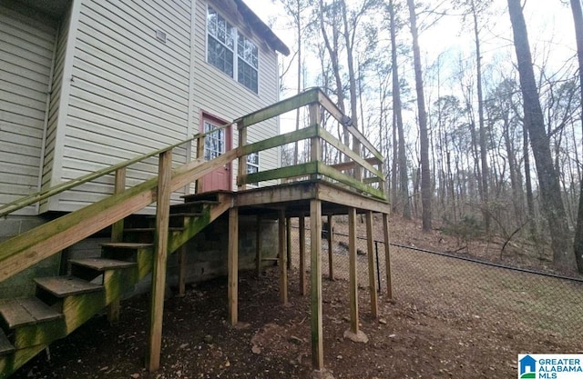 exterior space featuring stairway and a wooden deck