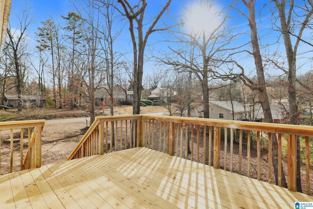 wooden deck with a residential view