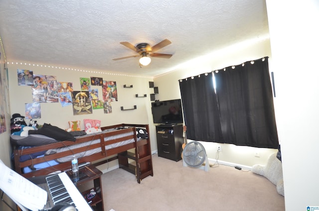 carpeted bedroom featuring a textured ceiling