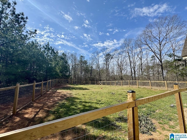 view of yard featuring a fenced backyard