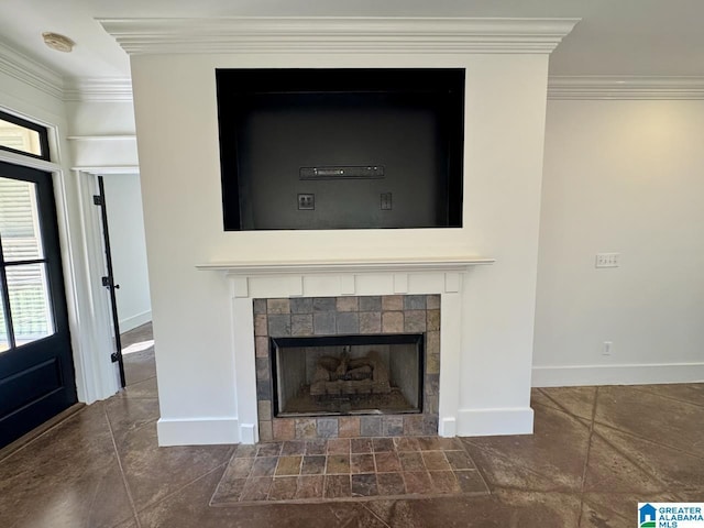 room details featuring ornamental molding, a tile fireplace, and baseboards