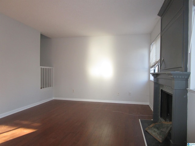 3830 Windhover Dr Unit 1, Vestavia Hills, AL 35216 - living room with a large fireplace, visible vents, baseboards, and wood finished floors
