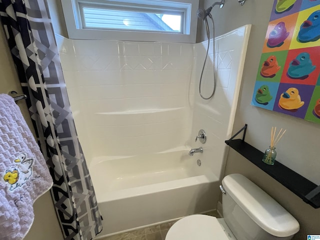 full bath featuring shower / bath combo and toilet