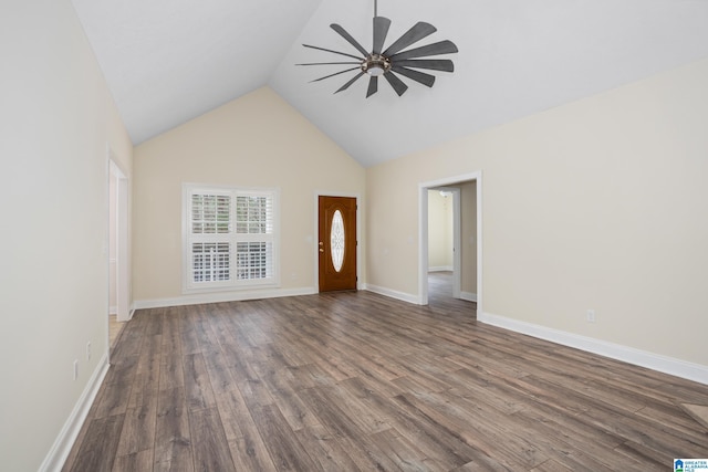 unfurnished living room with high vaulted ceiling, baseboards, a ceiling fan, and wood finished floors