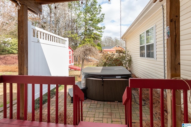 view of patio with a hot tub