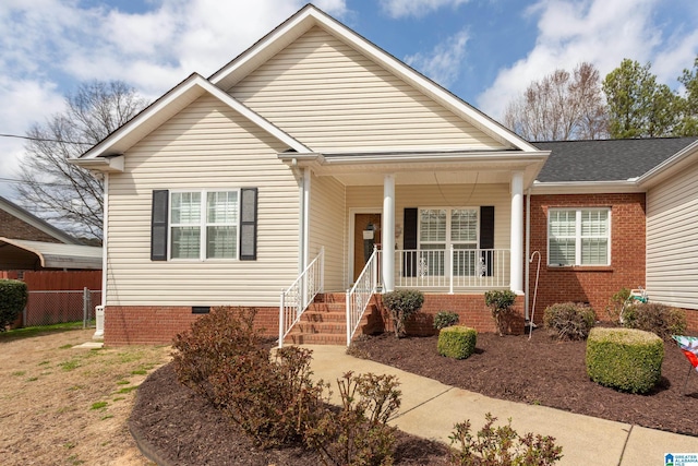 bungalow with crawl space, fence, and a porch