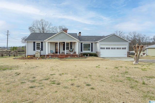 ranch-style house with covered porch, concrete driveway, a front lawn, and board and batten siding