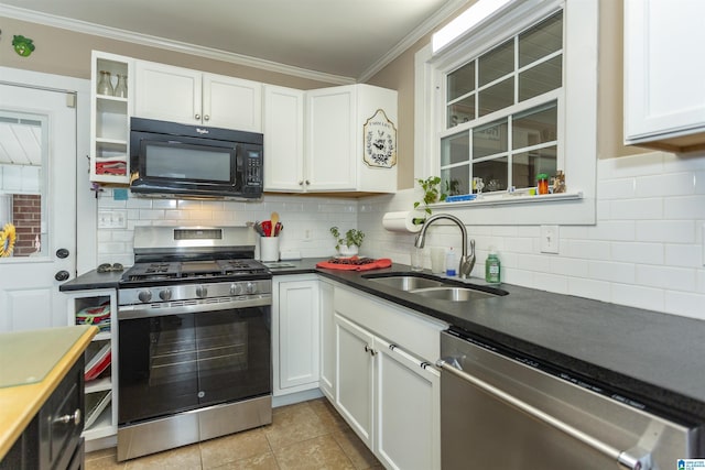 kitchen with stainless steel appliances, a sink, white cabinetry, ornamental molding, and backsplash