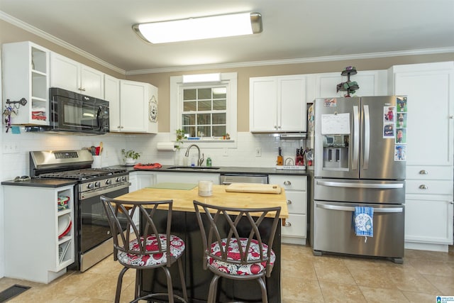 kitchen with open shelves, visible vents, decorative backsplash, appliances with stainless steel finishes, and a sink