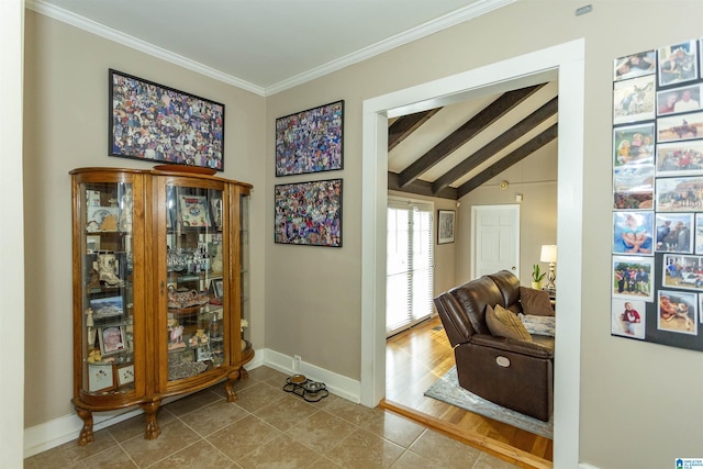 interior space featuring lofted ceiling with beams, crown molding, tile patterned flooring, and baseboards