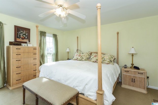 bedroom featuring light carpet and ceiling fan