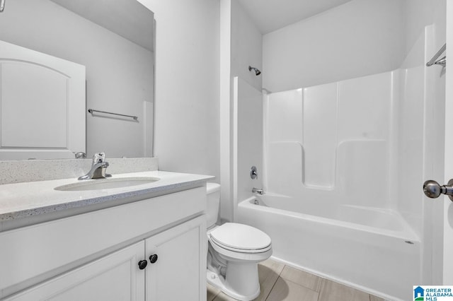 full bathroom featuring shower / tub combination, vanity, and toilet