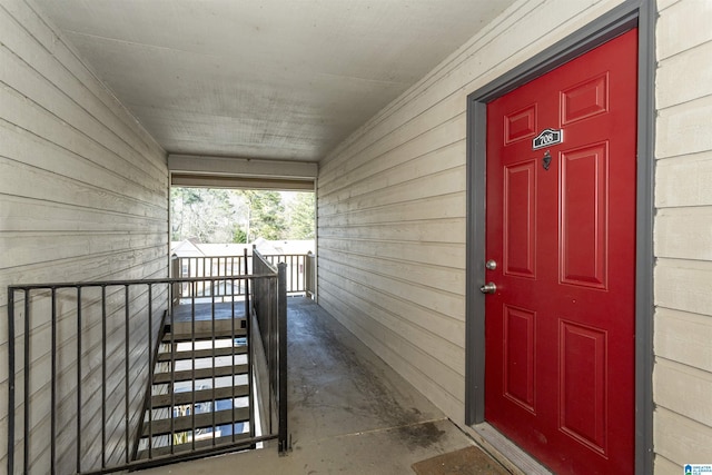 doorway to property featuring covered porch