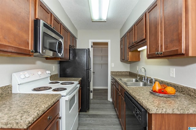 kitchen featuring black dishwasher, white electric stove, stainless steel microwave, a textured ceiling, and a sink