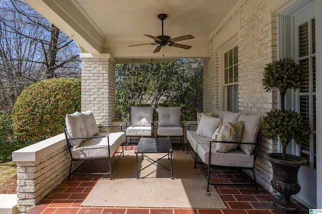 view of patio featuring an outdoor hangout area and a ceiling fan